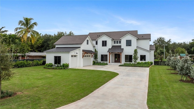 modern inspired farmhouse with a front yard and a garage