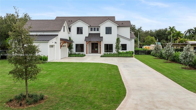 modern farmhouse style home with a front lawn