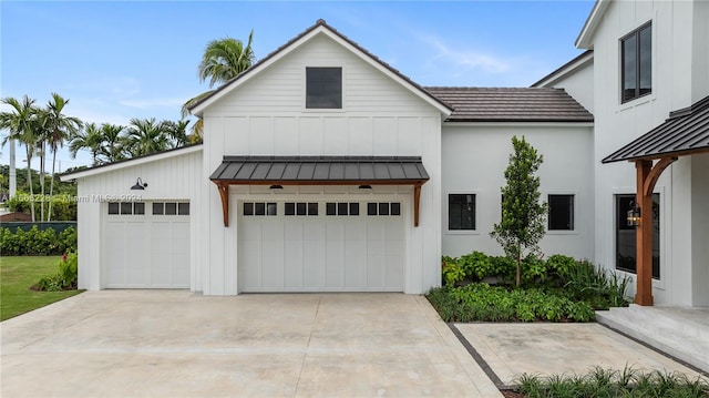 modern farmhouse style home with a garage