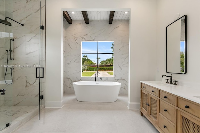 bathroom featuring beamed ceiling, vanity, and plus walk in shower