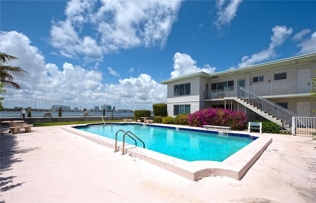 view of pool with a patio area