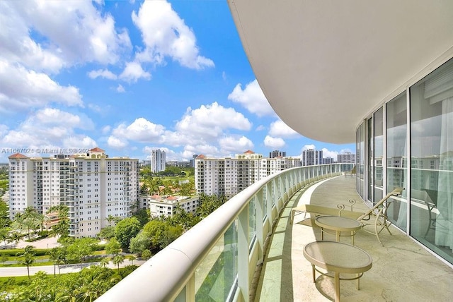balcony featuring a city view
