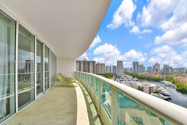 balcony with a city view and a water view