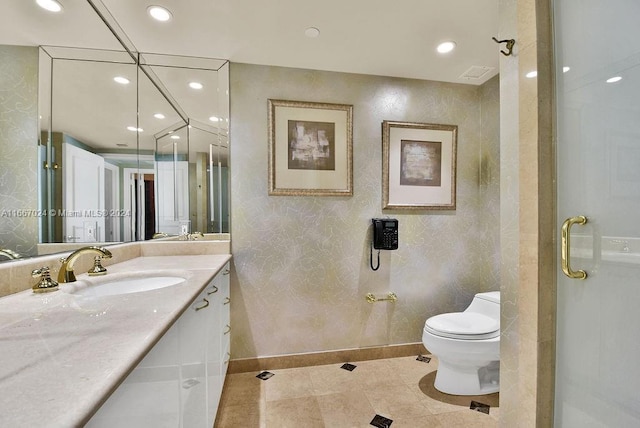 bathroom with recessed lighting, wallpapered walls, toilet, vanity, and baseboards