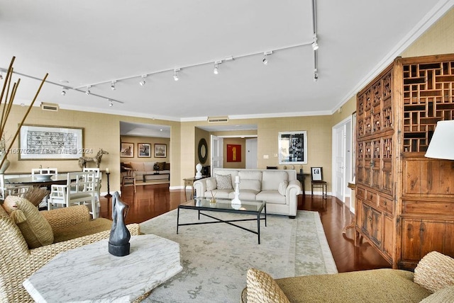 living room featuring wood-type flooring, crown molding, and track lighting