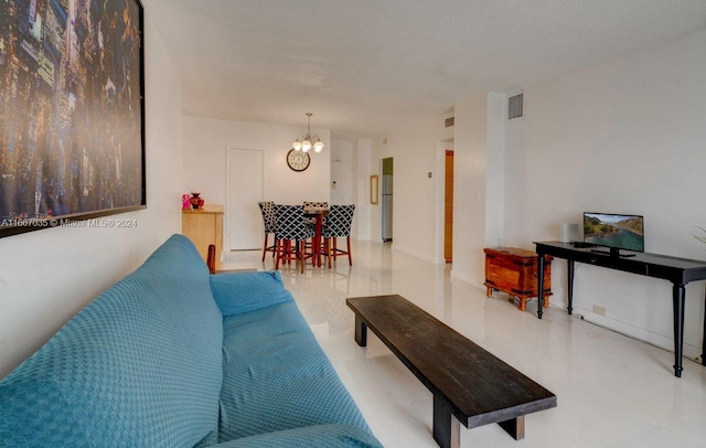 living room featuring a chandelier