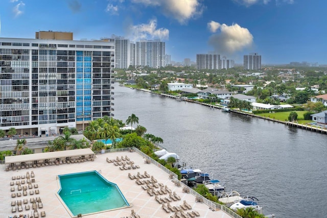 birds eye view of property featuring a water view