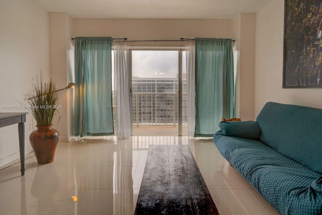 living room with a textured ceiling