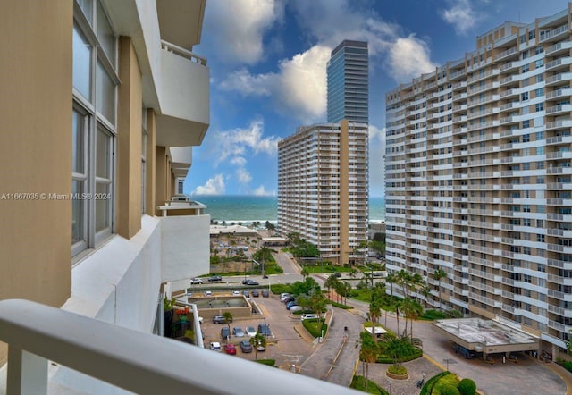 balcony featuring a water view