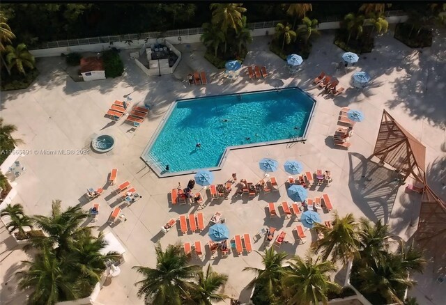 500 Bayview Dr Unit 325, Sunny Isles Beach, FL 33160 - community pool featuring a patio