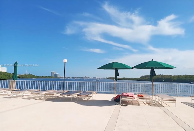 view of patio / terrace with a water view