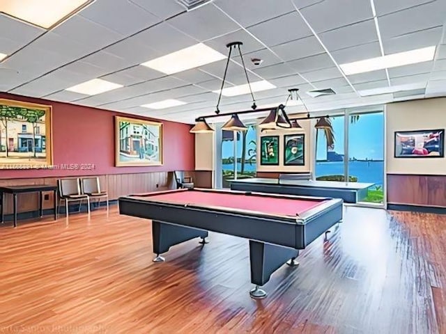 rec room featuring a drop ceiling, pool table, and hardwood / wood-style floors