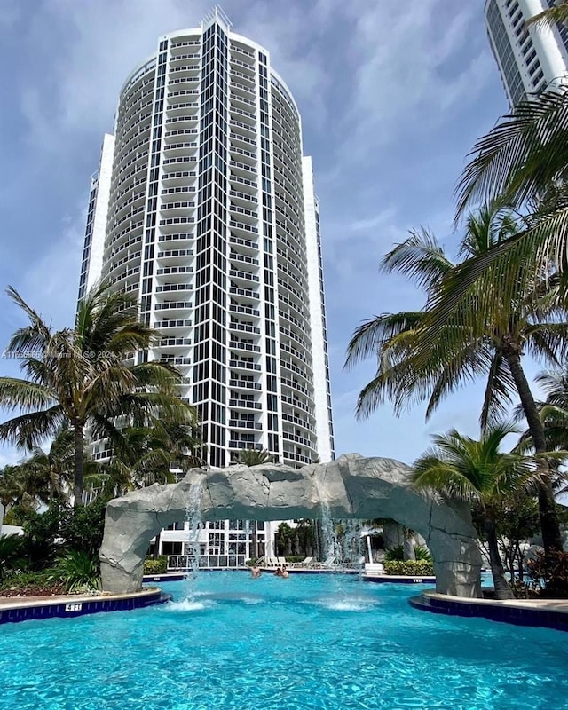 view of pool featuring pool water feature