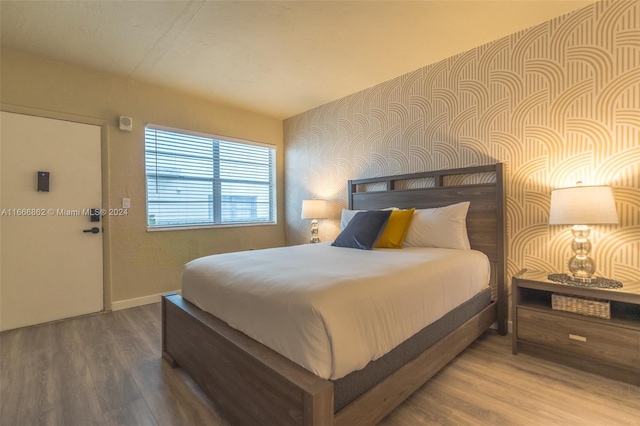 bedroom featuring hardwood / wood-style floors