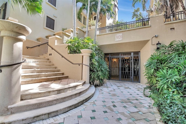 property entrance with a balcony