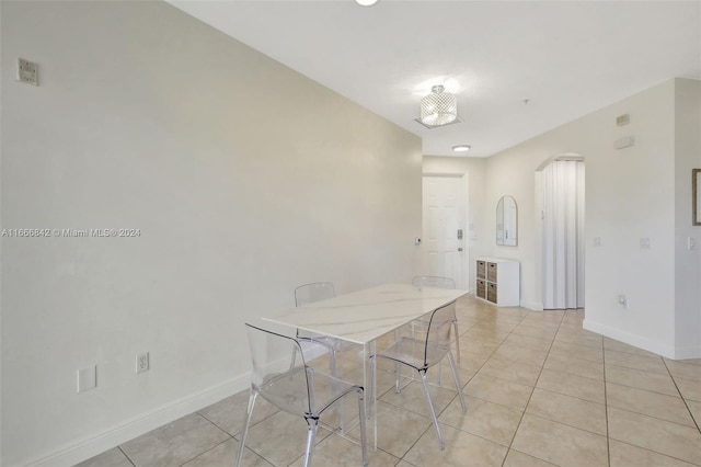 view of tiled dining space