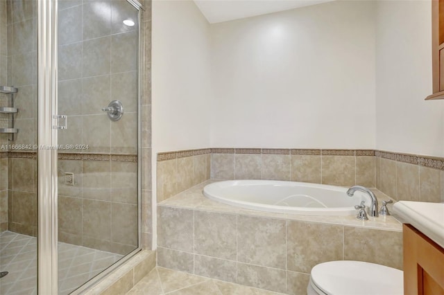 full bathroom with independent shower and bath, vanity, tile patterned flooring, and toilet