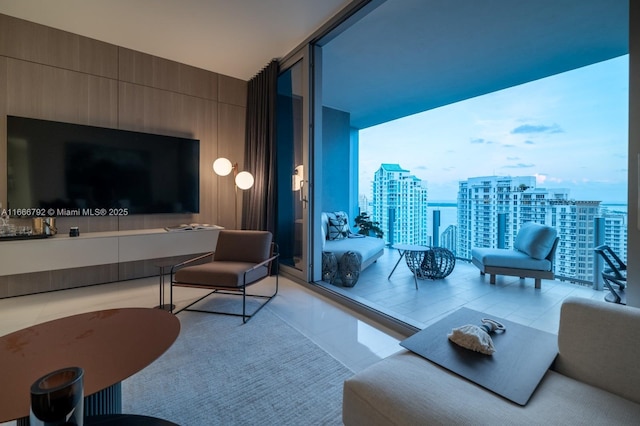 300 Biscayne Blvd Way Unit 3403, Miami, FL 33131 - living area featuring light tile patterned floors, a city view, and floor to ceiling windows