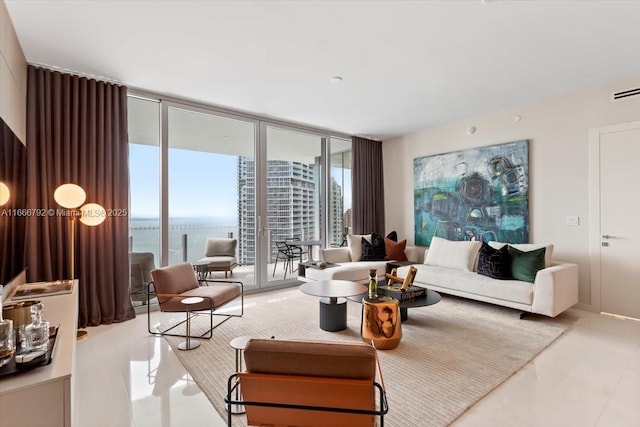 300 Biscayne Blvd Way Unit 3403, Miami, FL 33131 - living area featuring expansive windows, tile patterned flooring, and a water view