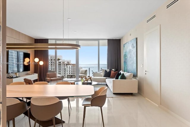 300 Biscayne Blvd Way Unit 3403, Miami, FL 33131 - dining space featuring floor to ceiling windows, a water view, and baseboards