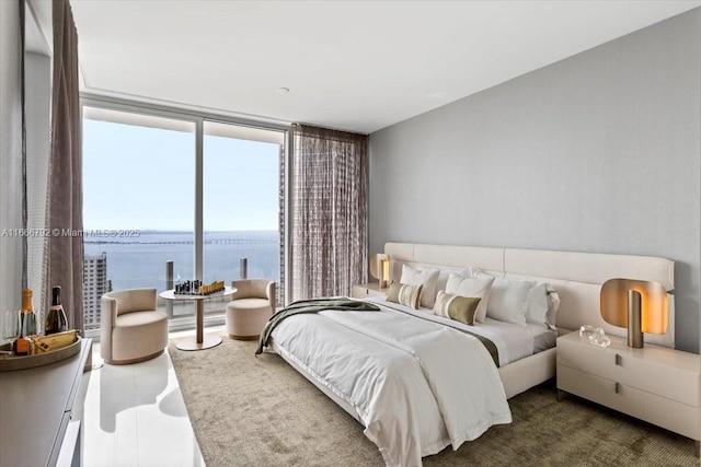 300 Biscayne Blvd Way Unit 3403, Miami, FL 33131 - bedroom featuring a wall of windows and a water view