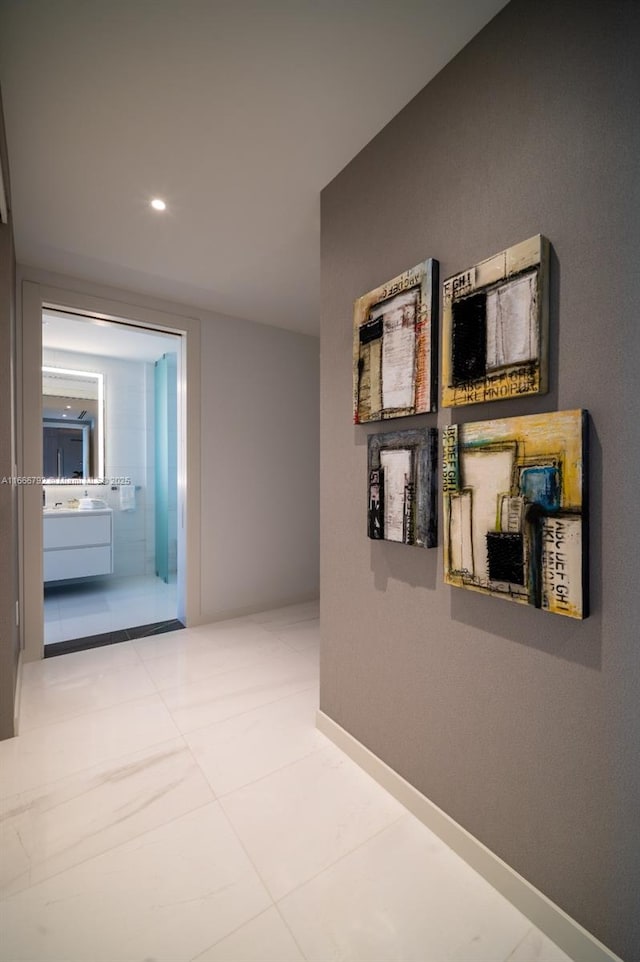 300 Biscayne Blvd Way Unit 3403, Miami, FL 33131 - corridor with baseboards, tile patterned floors, recessed lighting, and a sink