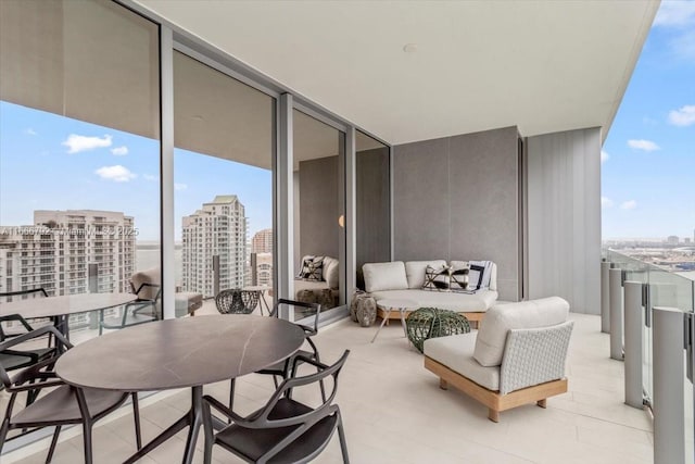 300 Biscayne Blvd Way Unit 3403, Miami, FL 33131 - balcony with a city view, an outdoor living space, and outdoor dining space