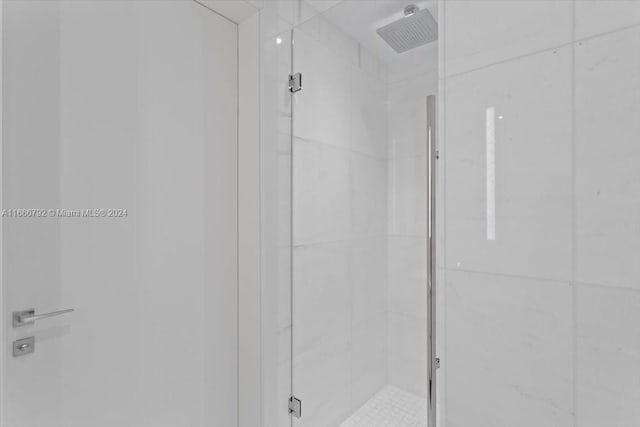 bathroom featuring walk in shower