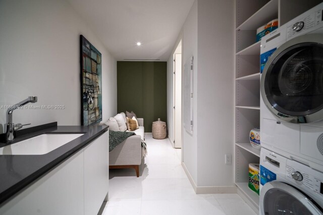 300 Biscayne Blvd Way Unit 3403, Miami, FL 33131 - clothes washing area with stacked washer / dryer and baseboards