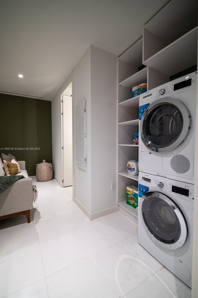 300 Biscayne Blvd Way Unit 3403, Miami, FL 33131 - washroom with stacked washer and clothes dryer, baseboards, and recessed lighting