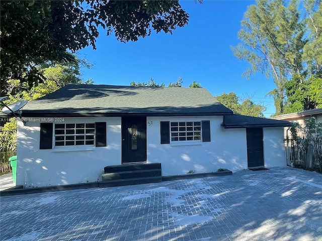 single story home with a patio