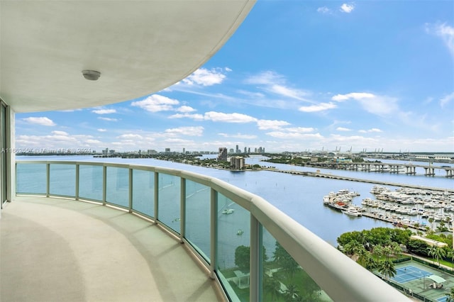 balcony featuring a water view