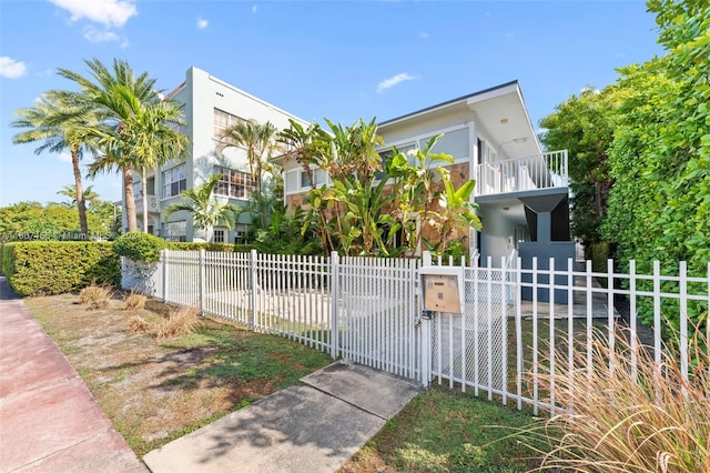 view of front of home with a balcony