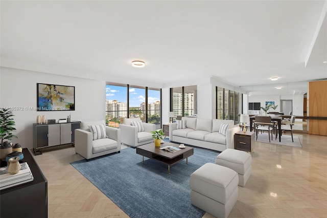 living room featuring light parquet flooring