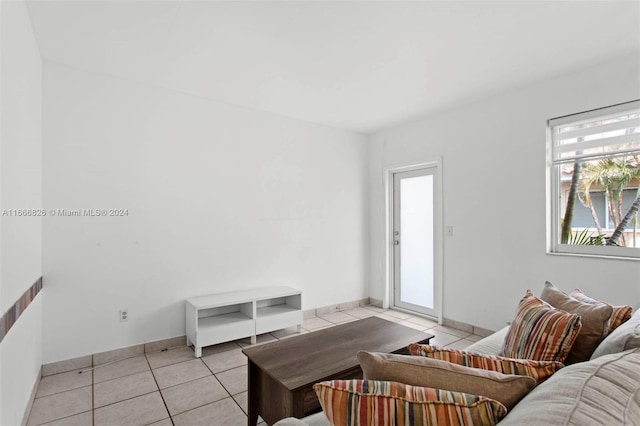 living room with light tile patterned floors