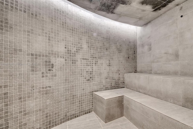 bathroom featuring tile walls and tile patterned flooring