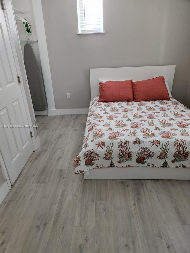 bedroom featuring light hardwood / wood-style flooring