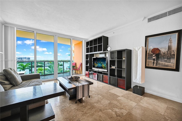 living room featuring floor to ceiling windows and crown molding