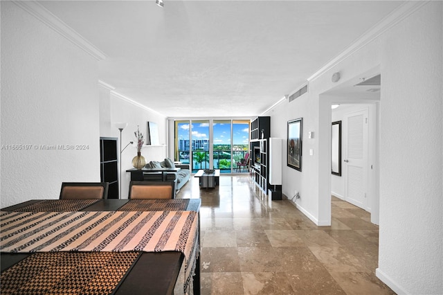 unfurnished dining area with ornamental molding and expansive windows