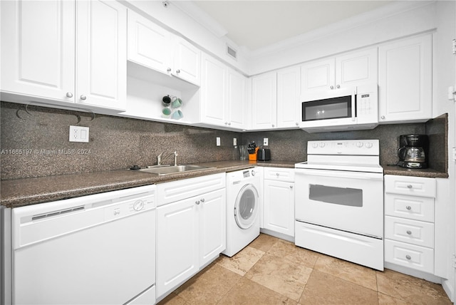 kitchen featuring white cabinets, sink, white appliances, washer / clothes dryer, and crown molding