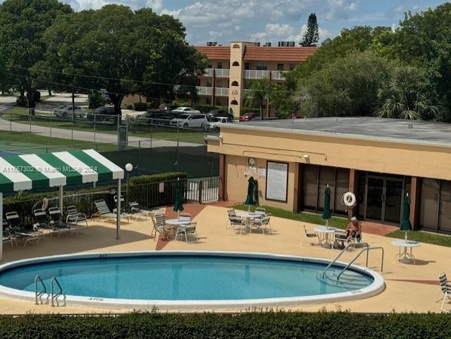 view of pool featuring a patio area