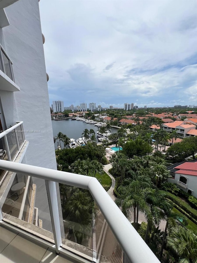 balcony featuring a water view