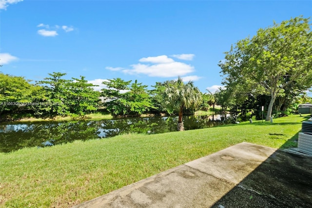 view of yard with a water view