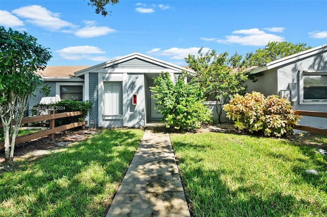 view of front of house with a front yard