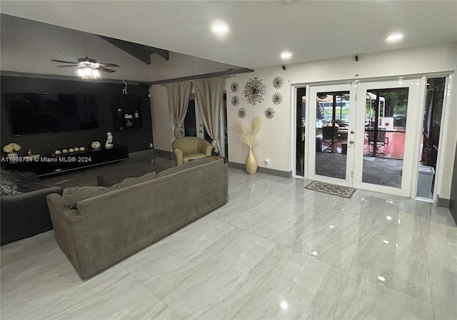 living room with french doors and ceiling fan