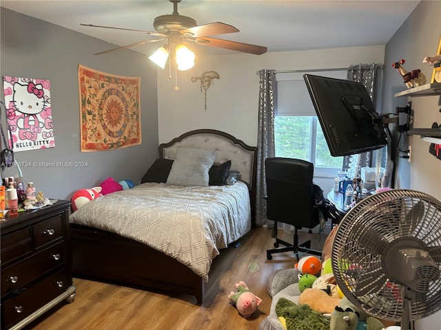 bedroom featuring ceiling fan and light wood-type flooring