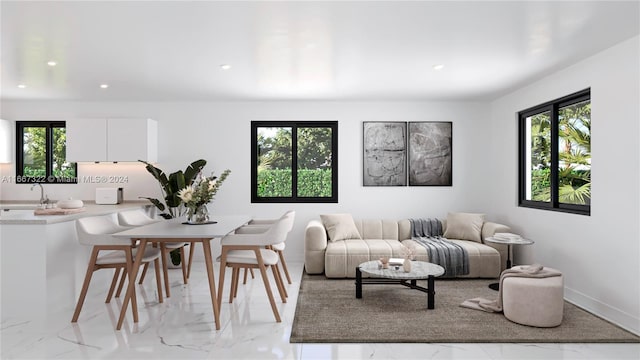 731 SW 12th Ave, Homestead, FL 33030 - living room with baseboards, recessed lighting, and marble finish floor