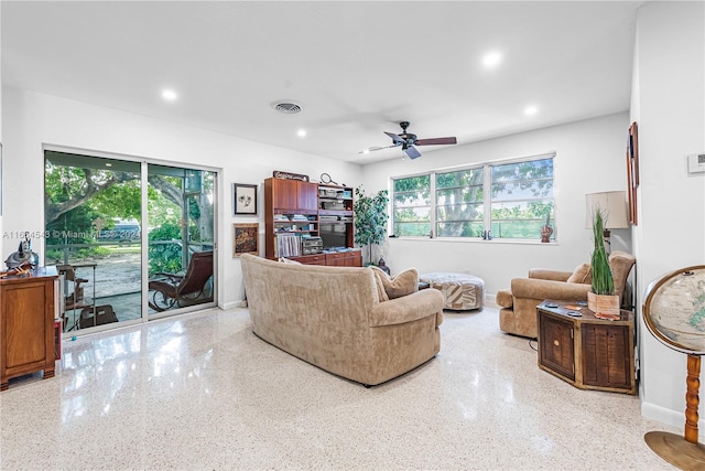 living room featuring ceiling fan