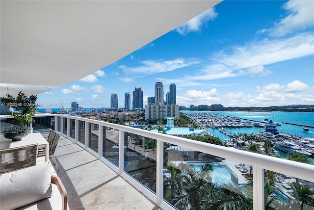 balcony featuring a water view