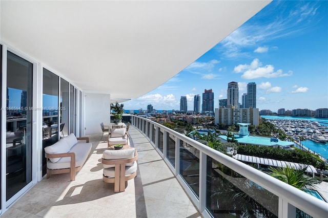 balcony featuring a water view